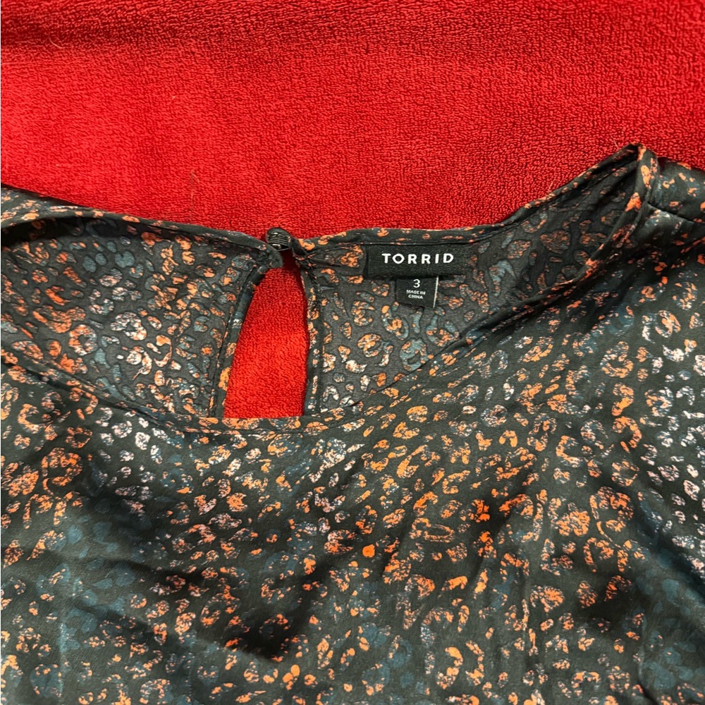 Torrid Black and Orange Animal Print Blouse